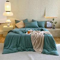Ensemble housse de couette coton vert avec boutonnière sur les taies d’oreiller