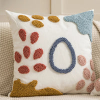 Housse Coussin Canapé avec Formes Géométriques Brodées sur un canapé