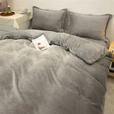 Parure de lit cocooning en tissu effet polaire – Douceur et chaleur